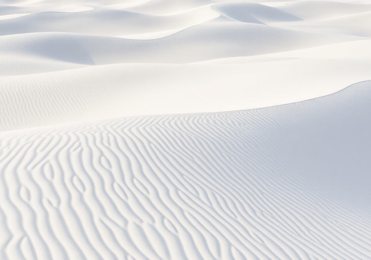 Soft white dune-like ripples and shadows in a minimalist scene